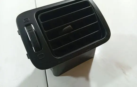 Dash center air vent grill