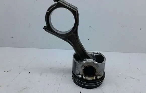 Piston with connecting rod