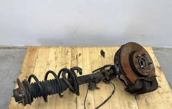Front shock absorber with coil spring