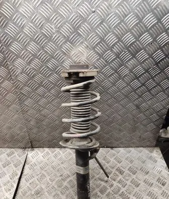 Volkswagen Caddy Front shock absorber with coil spring 