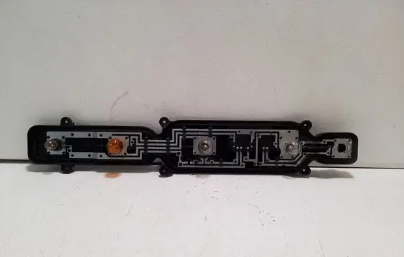Tail light bulb cover holder