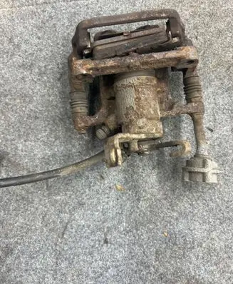 Opel Astra J Rear brake caliper 13407125