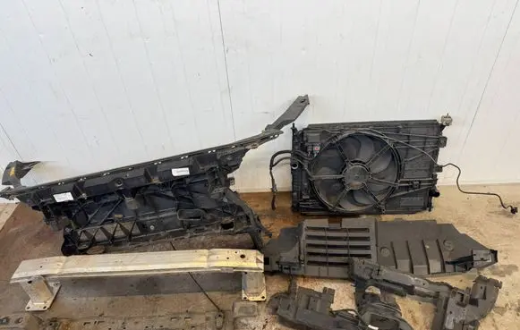 Radiator support slam panel
