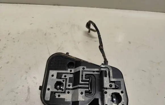 Volkswagen Touareg I Tail light bulb cover holder 7L6945257