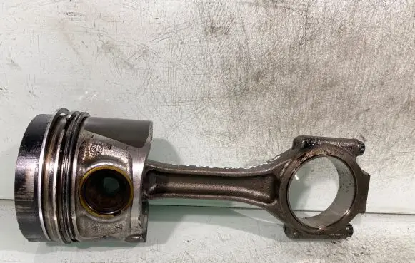 Piston with connecting rod