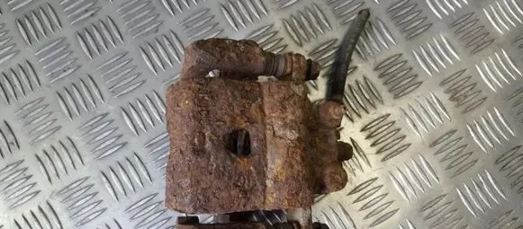 Suzuki Baleno EG Front brake caliper