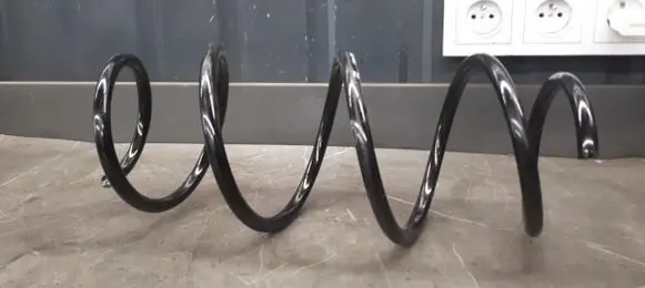 Volkswagen PASSAT B6 Front coil spring 46987