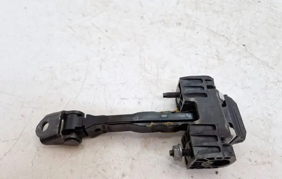 Front door check strap stopper