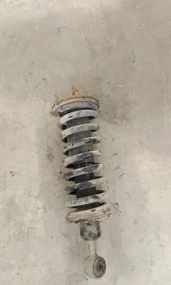 Nissan Navara D40 Front shock absorber with coil spring