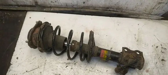 Toyota Corolla E120 E130 Front shock absorber with coil spring 