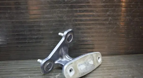 Front door lower hinge