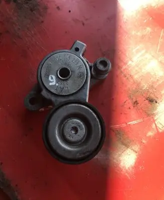 Volkswagen Scirocco Generator/alternator belt tensioner 03C145299M