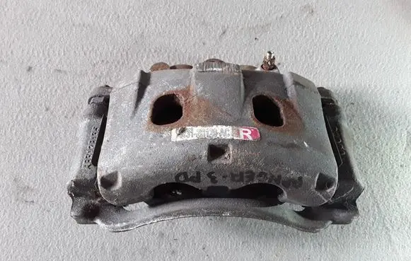 Ford Ranger Front brake caliper AB312B120AC