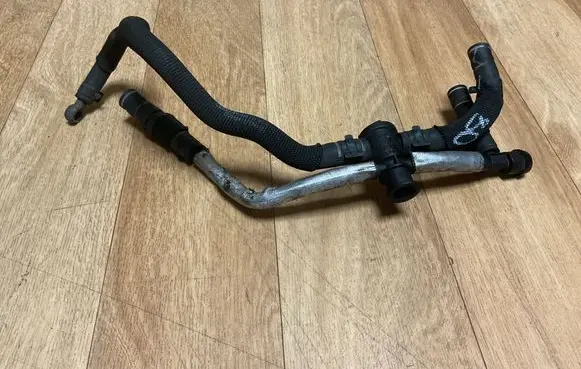 Volkswagen Touareg II Engine coolant pipe/hose 059121671B