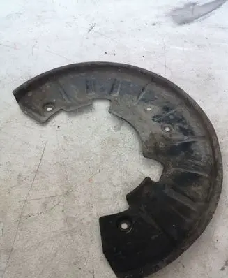 Volkswagen Touareg I Front brake disc dust cover plate 7L0615311