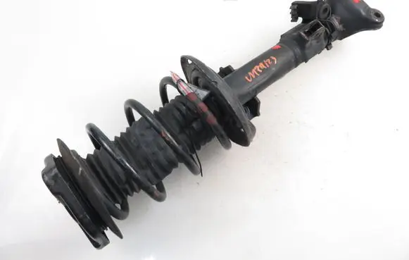 Mercedes-Benz E C207 W207 Front shock absorber with coil spring 2073207138