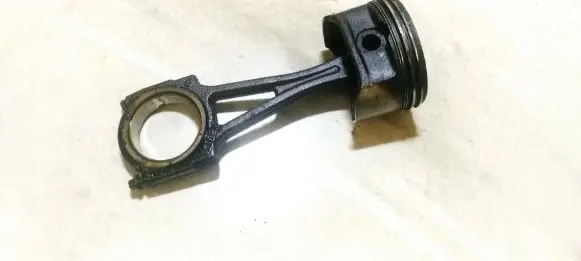Piston with connecting rod