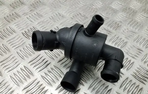 Thermostat/thermostat housing