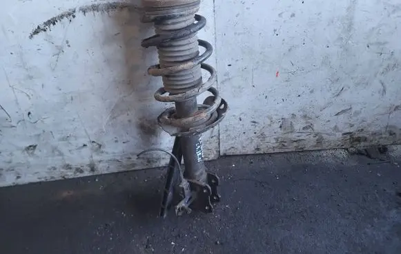 Opel Astra H Front shock absorber with coil spring