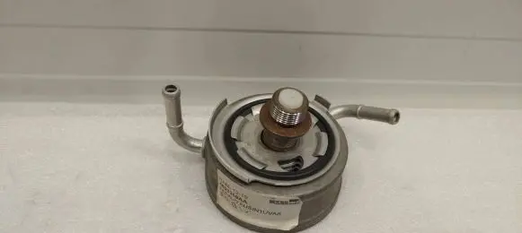 Oil filter mounting bracket