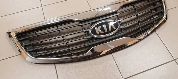 KIA Sportage Front bumper upper radiator grill 863523w000
