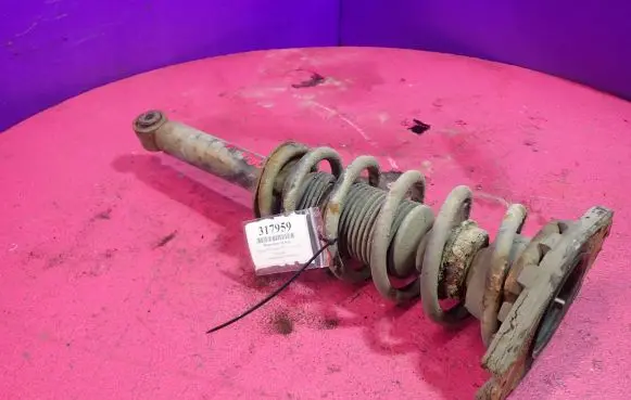 Nissan Primera Rear shock absorber with coil spring 