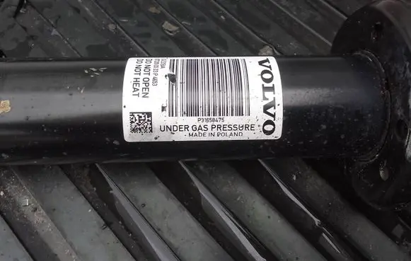 Volvo V60 Front shock absorber with coil spring 31658475