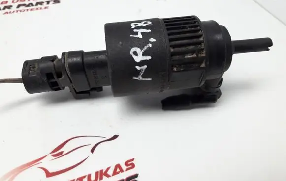 Renault Laguna I Windscreen/windshield washer pump 7700821782