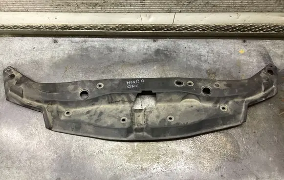 Engine bonnet/hood lock trim molding