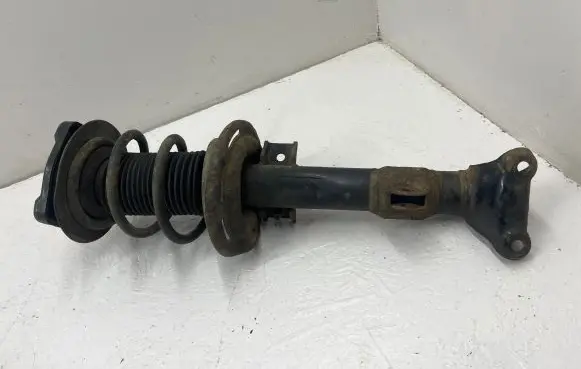 Front shock absorber with coil spring