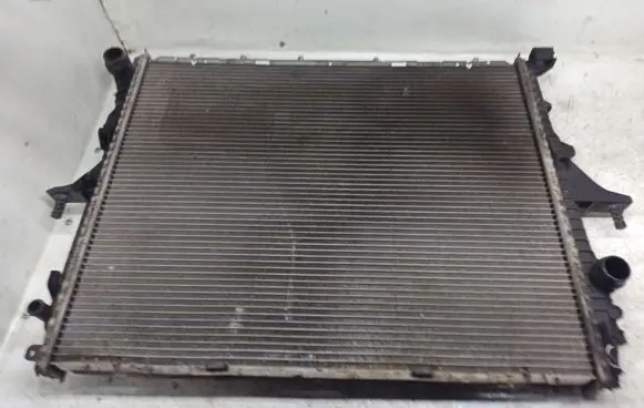 Volkswagen Touareg I Coolant radiator 7L6121253A
