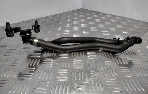 Mercedes-Benz E W210 Engine coolant pipe/hose 2108300024