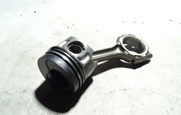 Piston with connecting rod