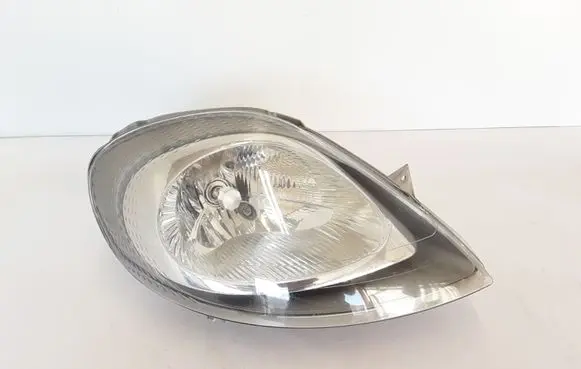 Opel Vivaro Headlight/headlamp 7700311372