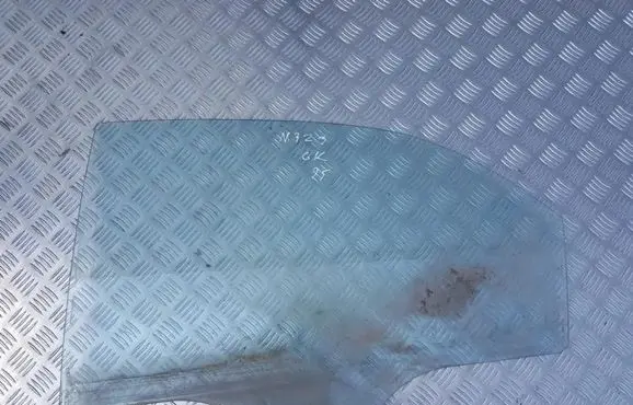Mazda 323 Rear door window glass 