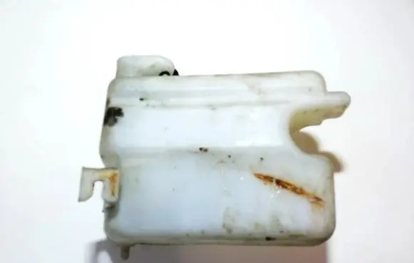 Renault Twingo I Windshield washer fluid reservoir/tank 7700817588