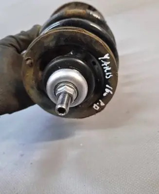 Toyota Yaris Front shock absorber with coil spring