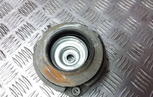 Volkswagen Touran I Front upper strut mount 1K0412331B