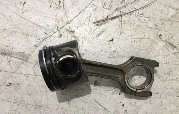 Piston with connecting rod