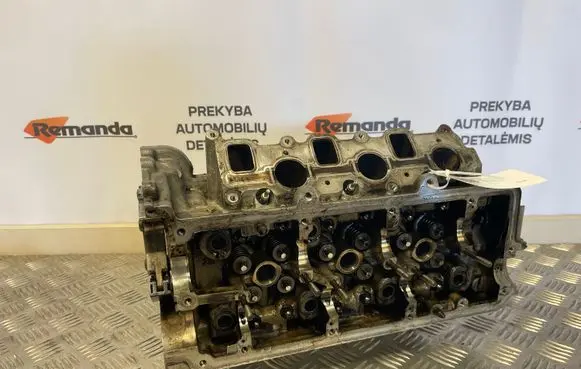 Volkswagen Touareg I Engine head 0593AG 0261059353