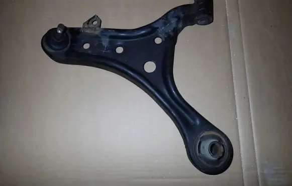 Toyota iQ Rear suspension control arm 