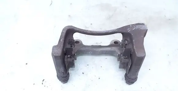 Volkswagen PASSAT B6 Brake caliper pad carrier rear 