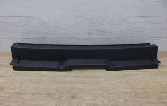Engine bonnet/hood lock trim molding