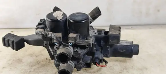 Coolant heater control valve