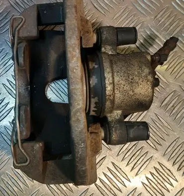 Ford Focus Front brake caliper AV612B302AA