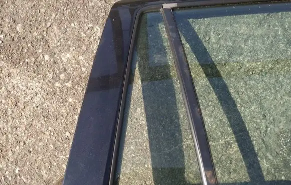 Mazda 2 Rear vent window glass 
