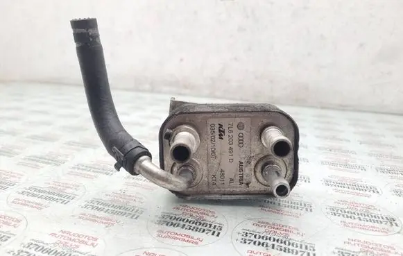 Volkswagen Touareg I Oil filter mounting bracket 7L6203491D