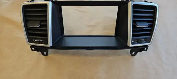 Dash center air vent grill