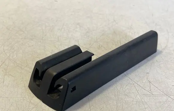 Tesla Model S Front driver seat rail trim 103167500A