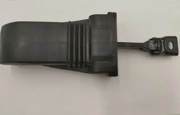 Front door check strap stopper